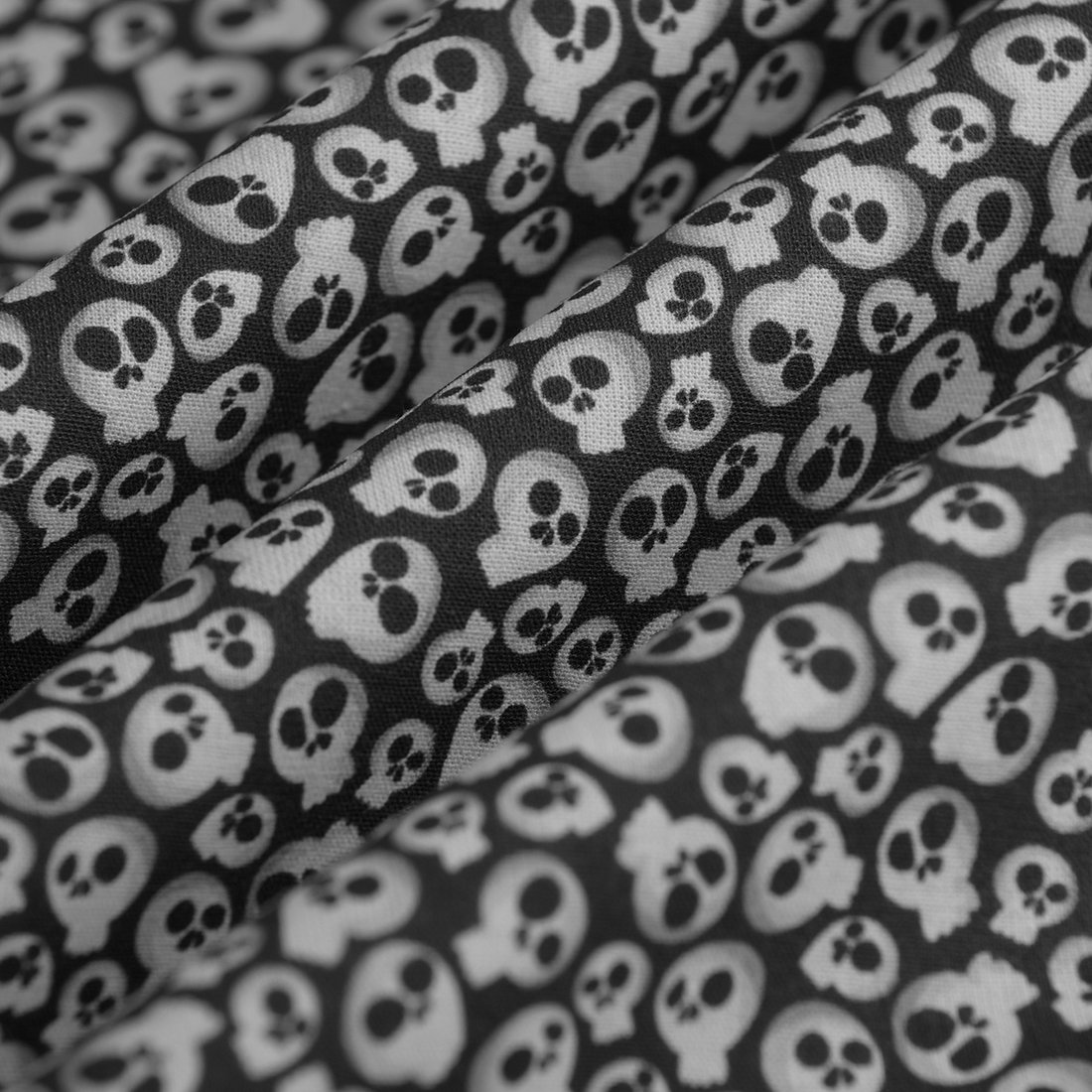 Tissu cretonne tête de mort noir