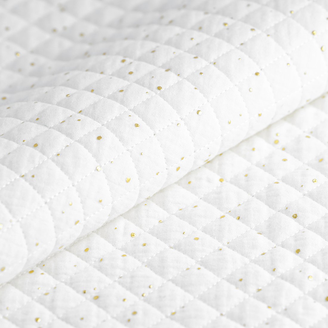 Tissu matelassé double gaze pois doré écru